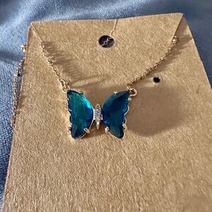 Blue Crystal Butterfly Necklace on a Gold Chain